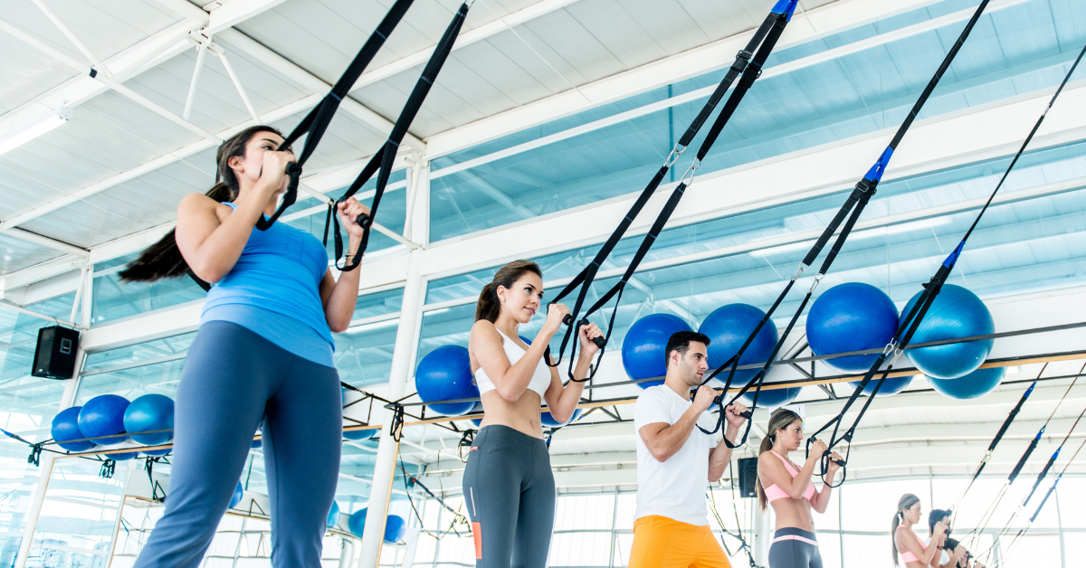 Image depicting a New Year's exercise routine with people engaging in various activities like jogging, yoga, and strength training, symbolizing a fresh start to fitness in the new year.
