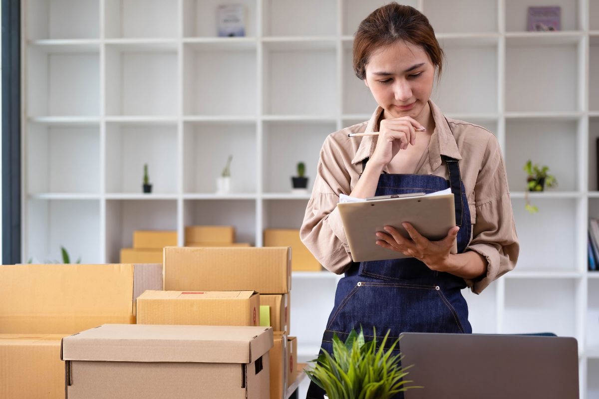 Person documenting home items for an inventory checklist to help with insurance claims