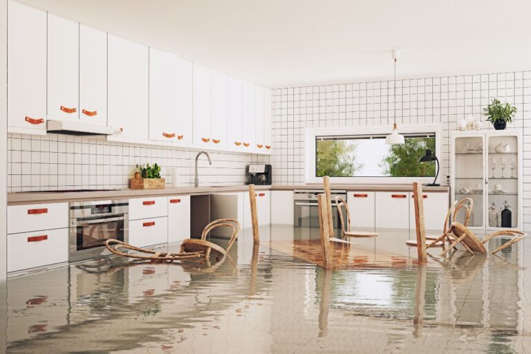 Furniture and floor damaged by indoor flooding