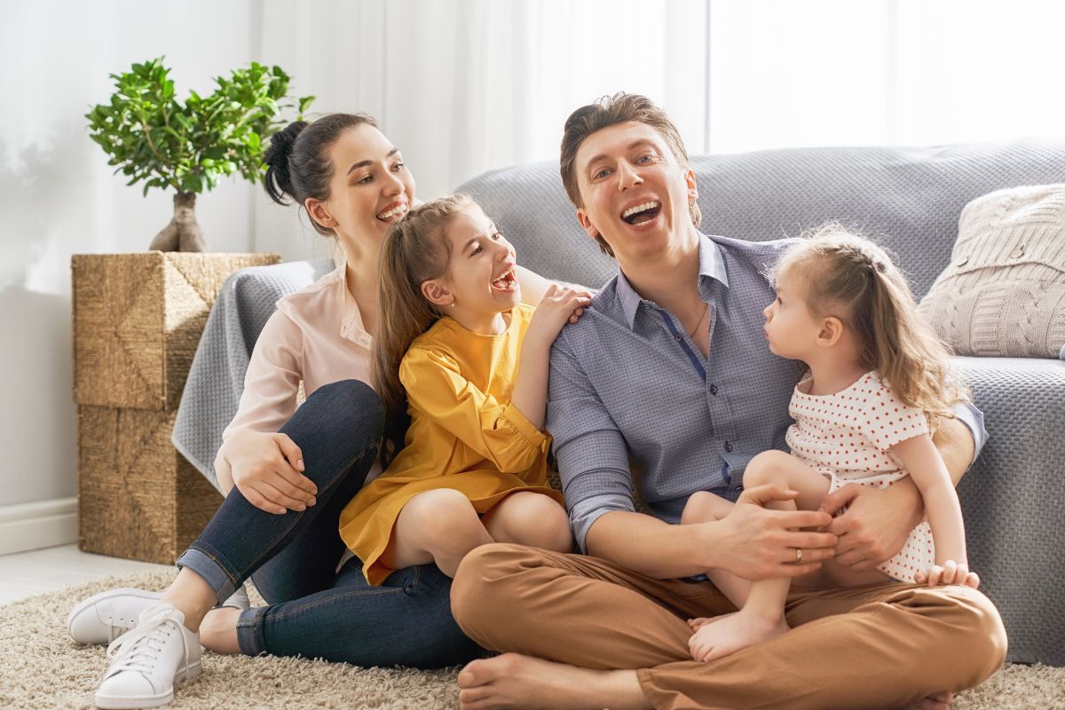 Happy family enjoying life without worry of financial emergencies